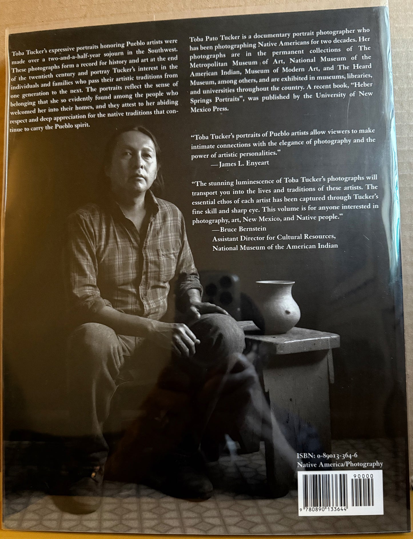 Tucker, Toba Pato. Pueblo Artists: Photographic portraits by Toba Pato Tucker.