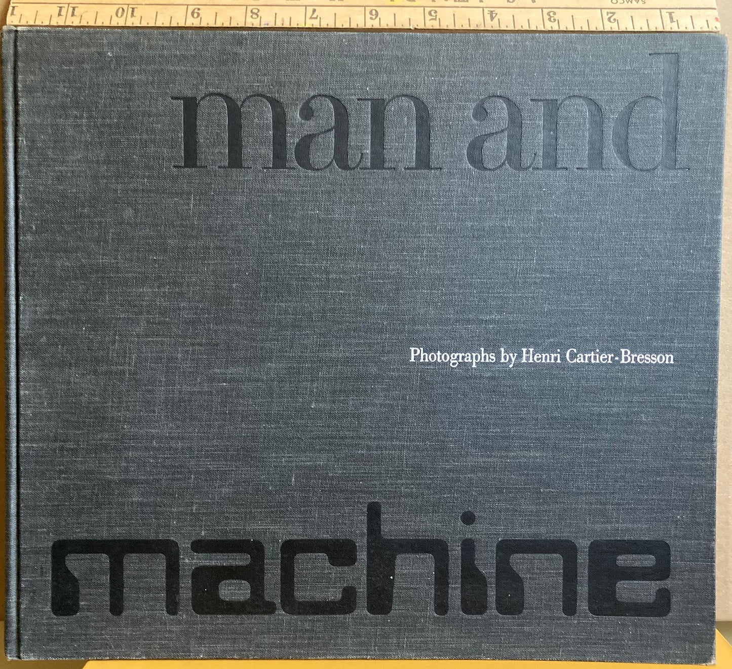Cartier-Bresson, Henri. Man and Machine by Henri Cartier-Bresson.