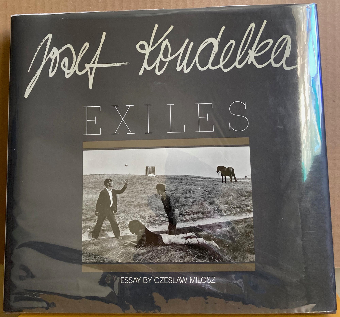 Koudelka, Josef.  Exiles. Photographs by Josef Koudelka. First edition.