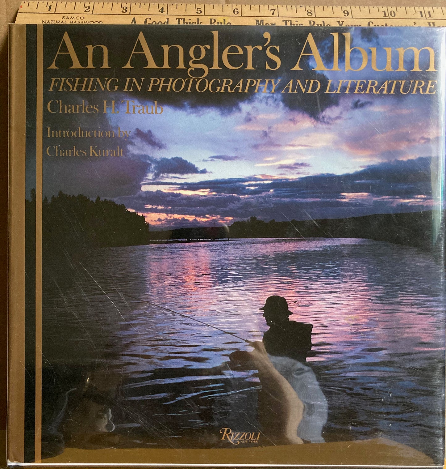 Fishing. An Angler’s Album: Fishing in Photography and Literature by Charles Traub. Introduction by Charles Kuralt.