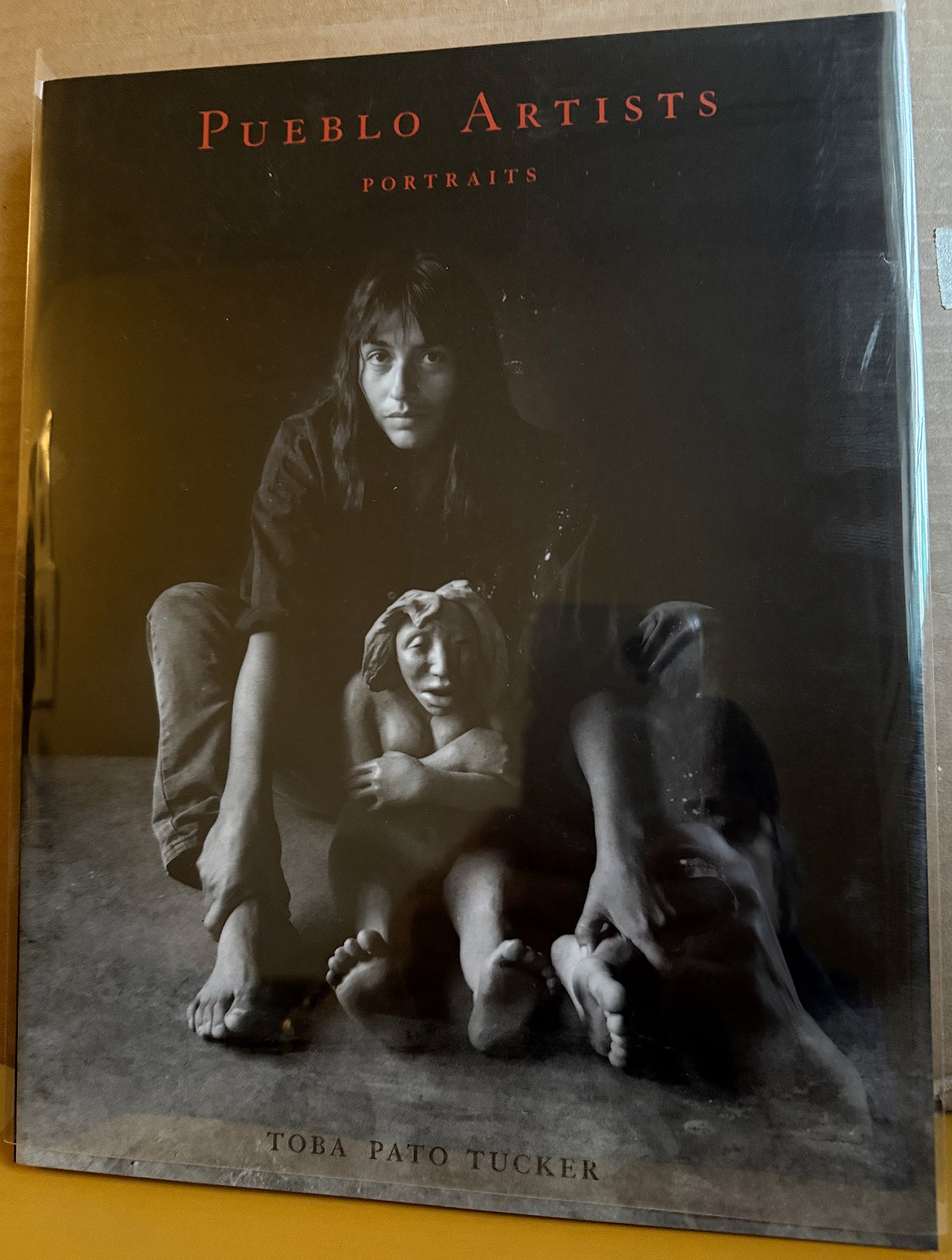 Tucker, Toba Pato. Pueblo Artists:  Photographic portraits by Toba Pato Tucker.