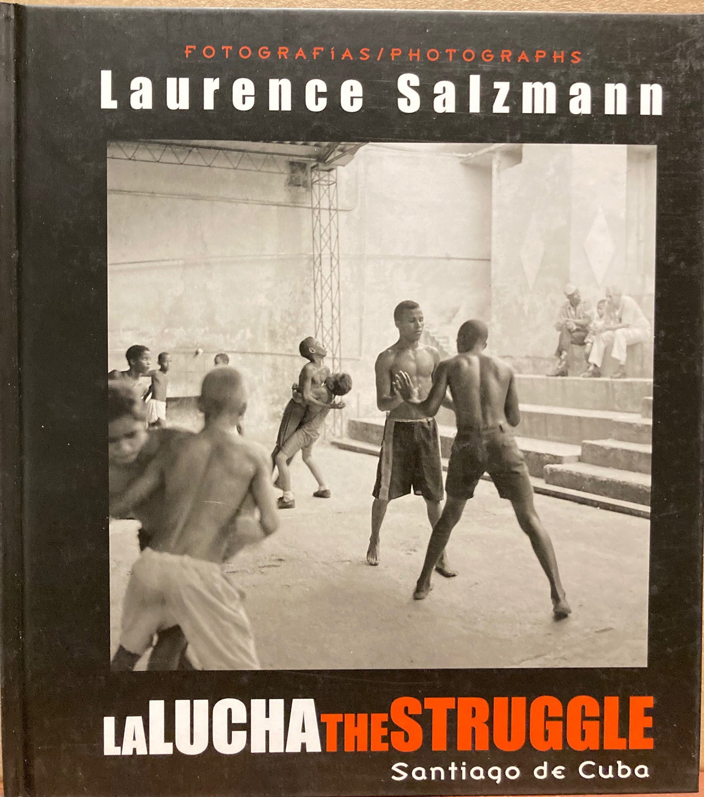 Salzmann, Laurence. La Lucha. The Struggle. Santiago de Cuba. Photographs by Laurence Salzmann. Signed.