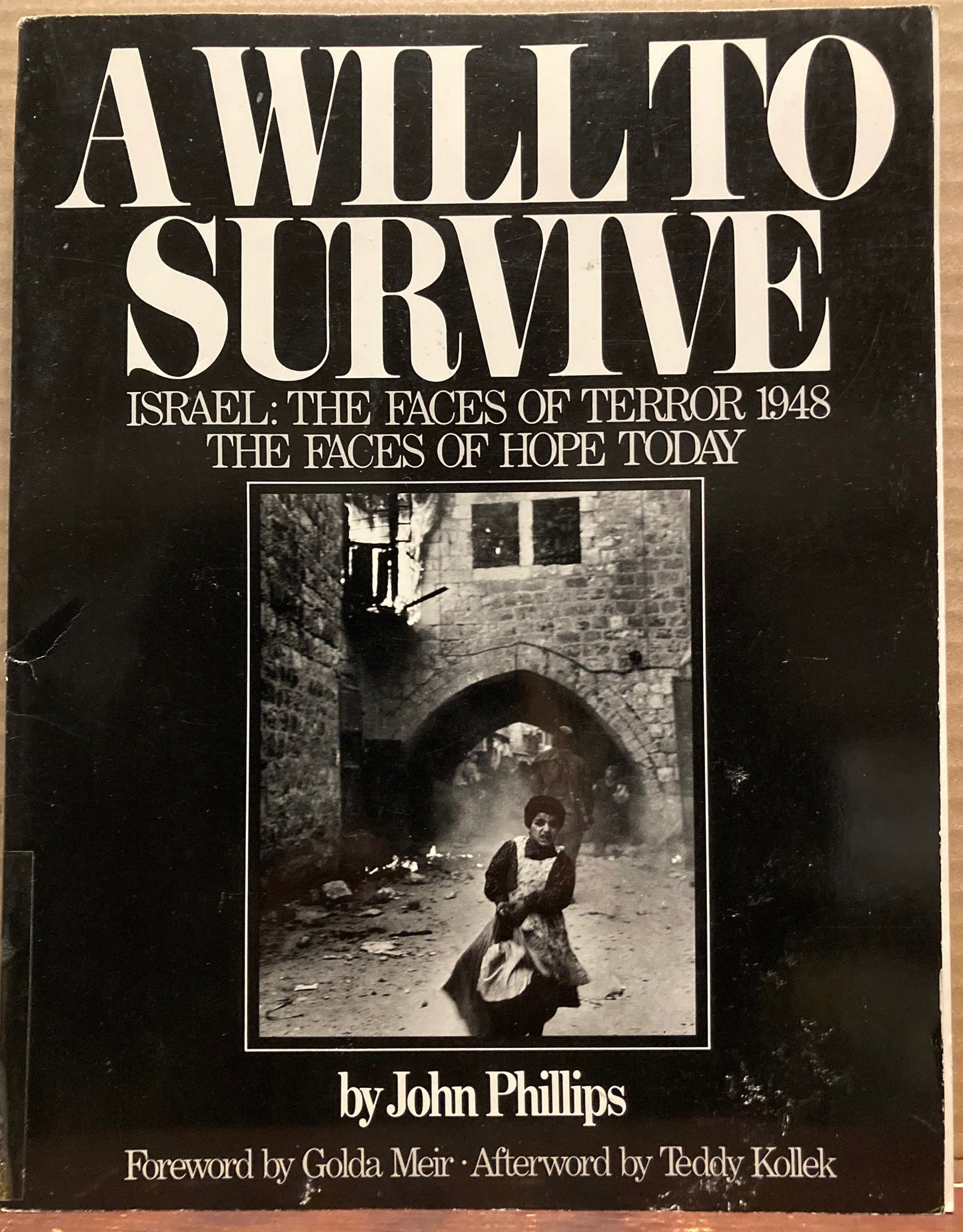 Phillips, John. A Will to Survive. Israel: The Faces of Terror 1948. The Faces of Hope Today.  By John Phillips.